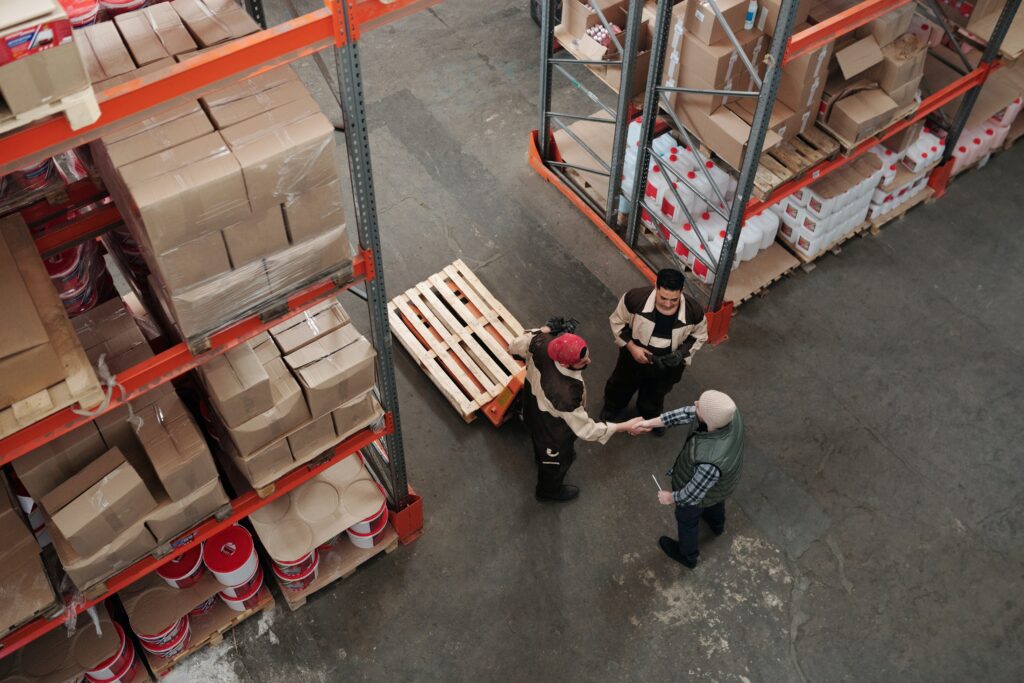 Meeting workers at a factory inspection