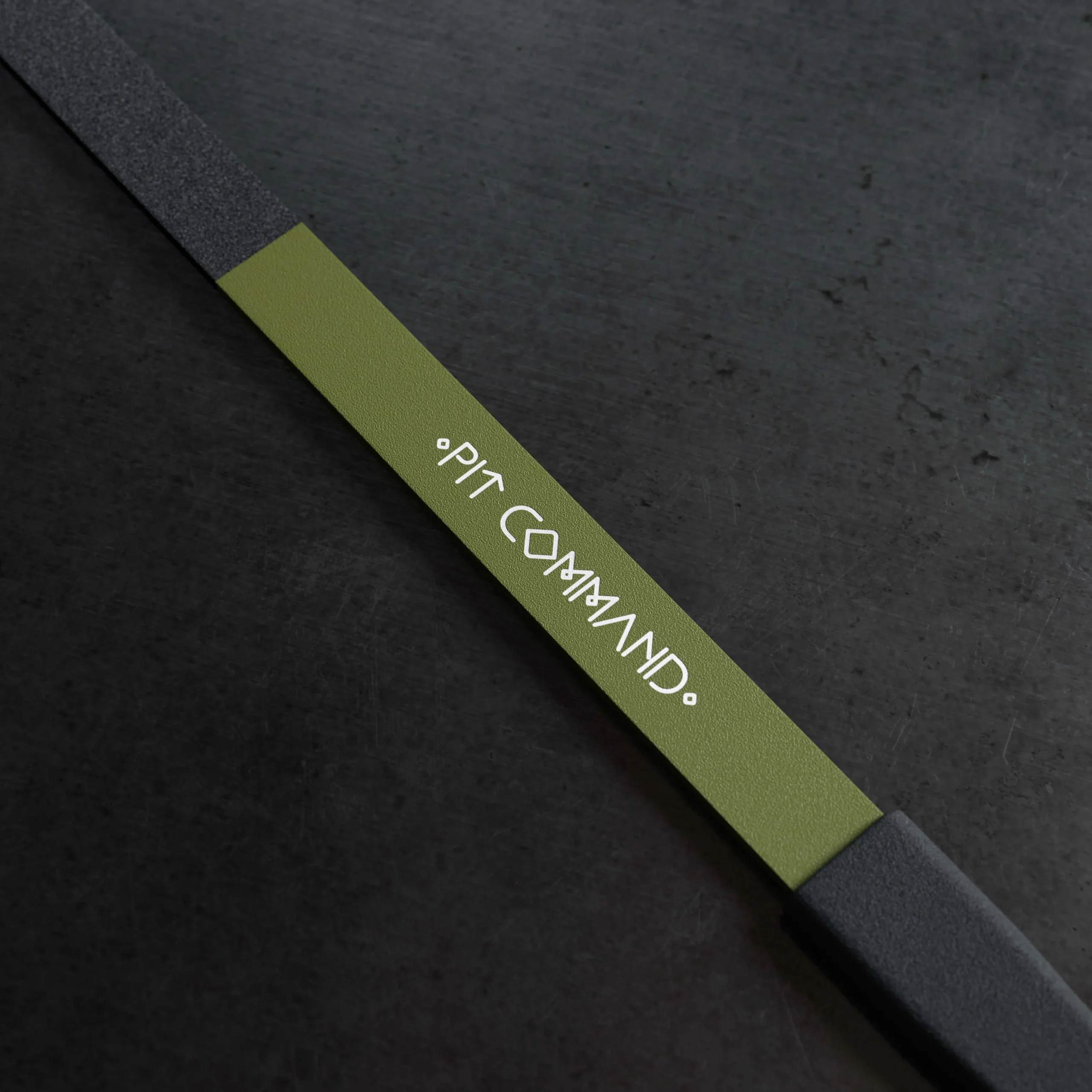 Pit Command fire pit tool in green and black
